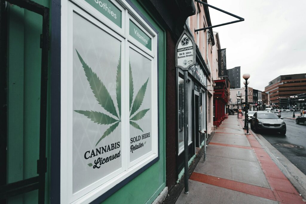 a store front with a marijuana leaf on it